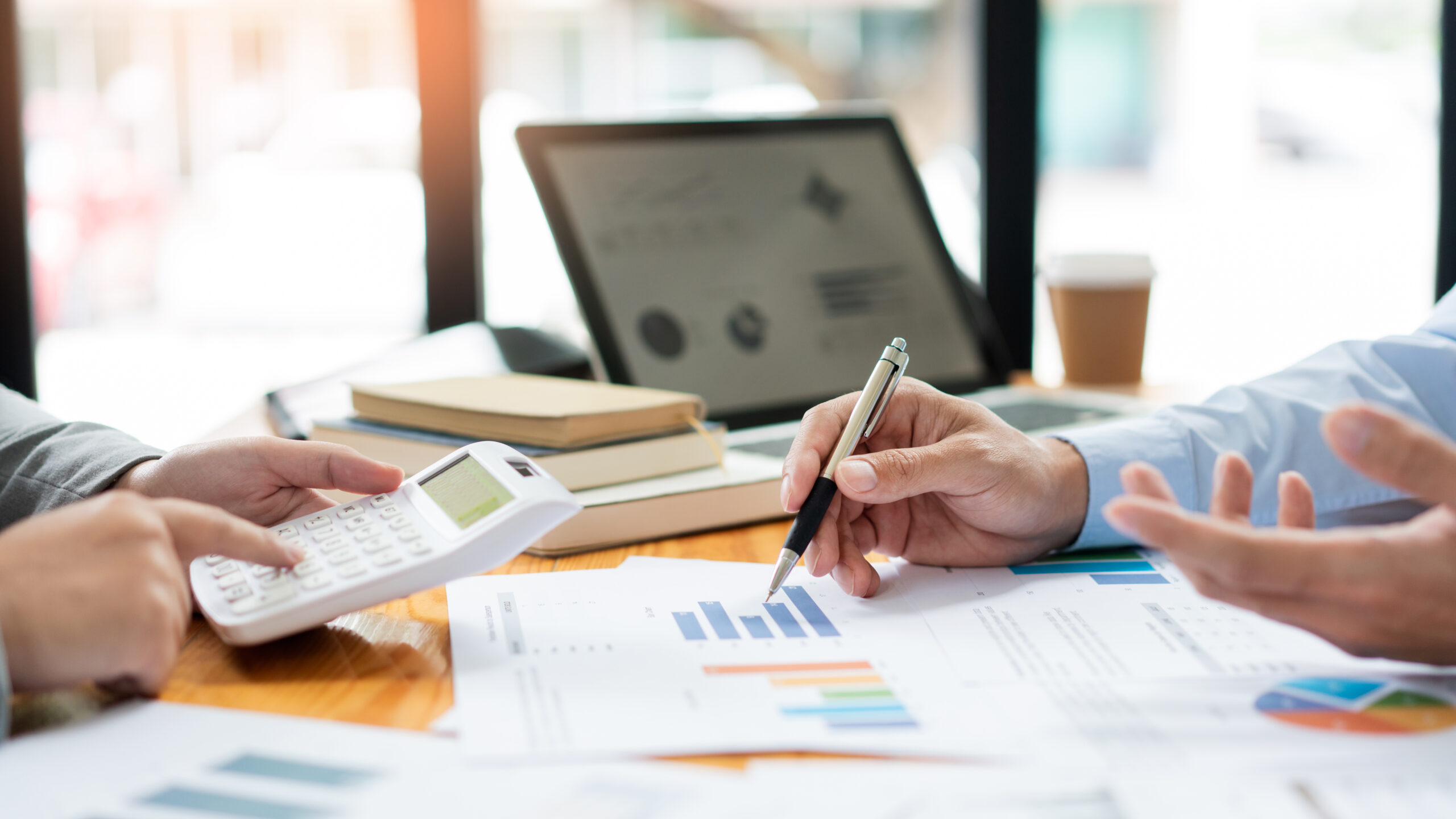 277a67d40551bf2764b66260fcc269d Business negotiation concept the female broker estimating the number of estate and checking it with the male broker.